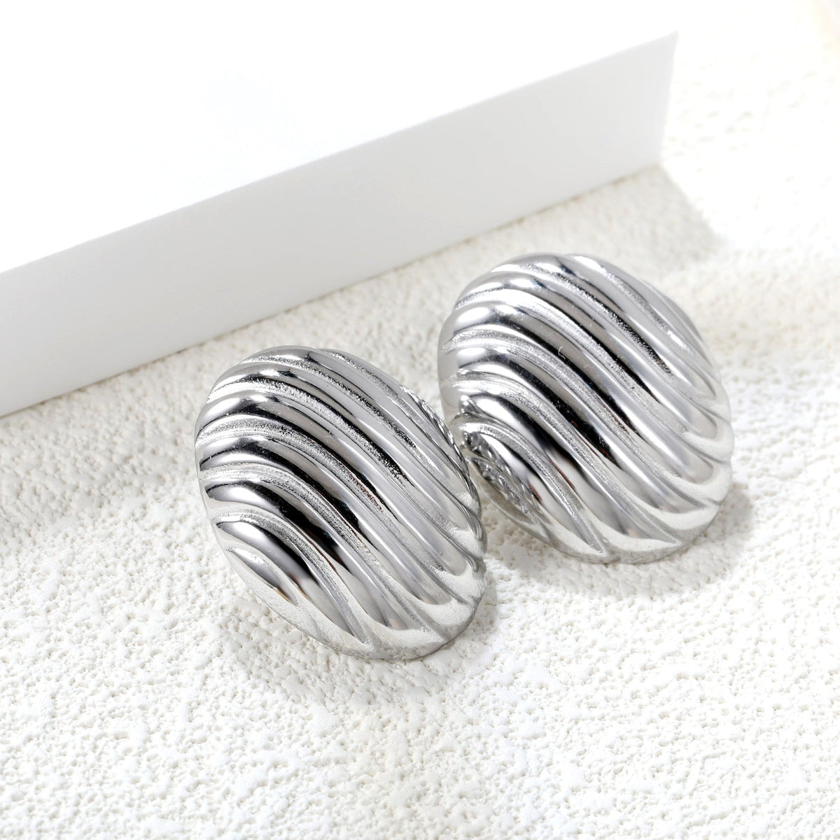 Pendientes Oval Stripe Texture con fusión en Oro 18K
