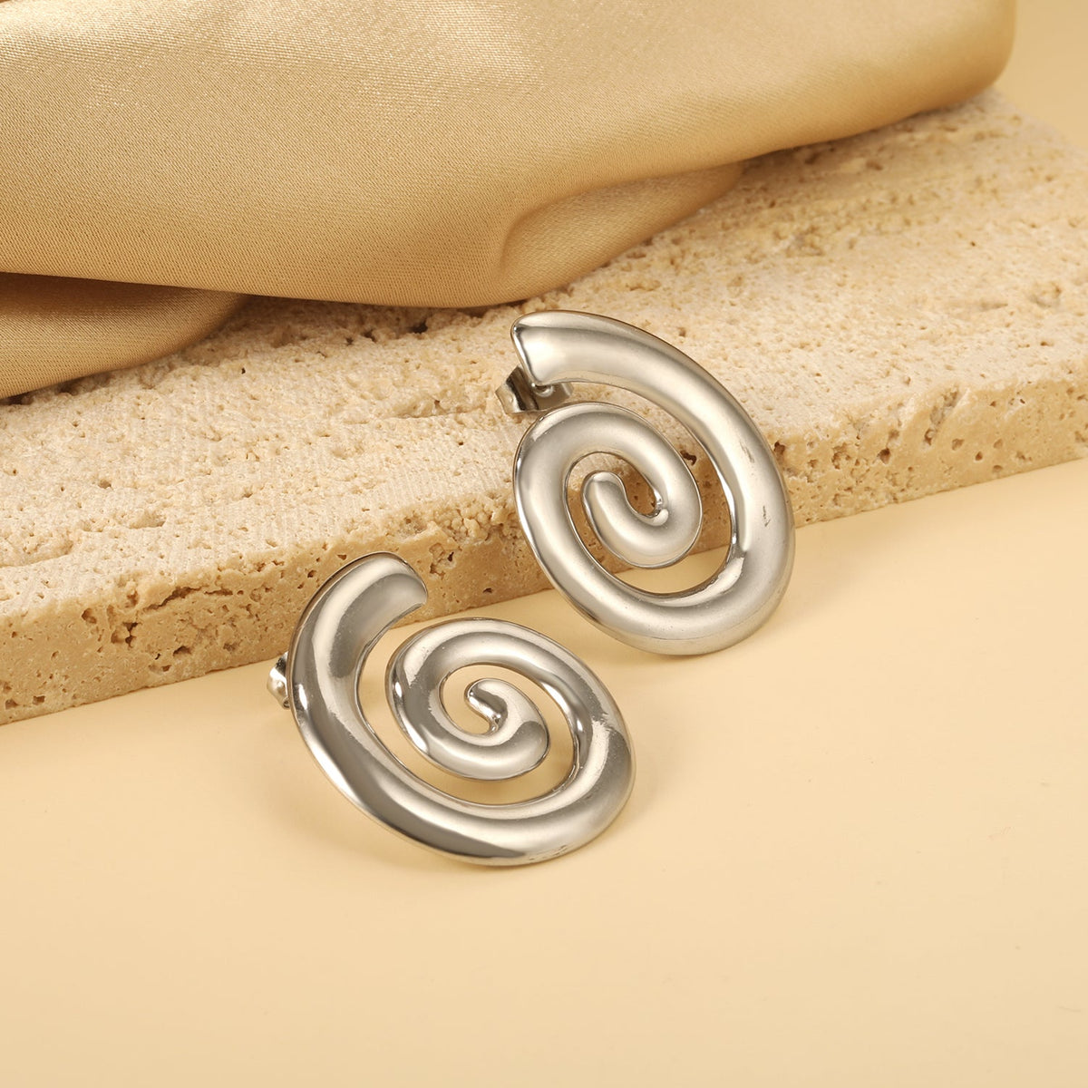 Pendientes Spiral Infinity con fusión en Oro 18K