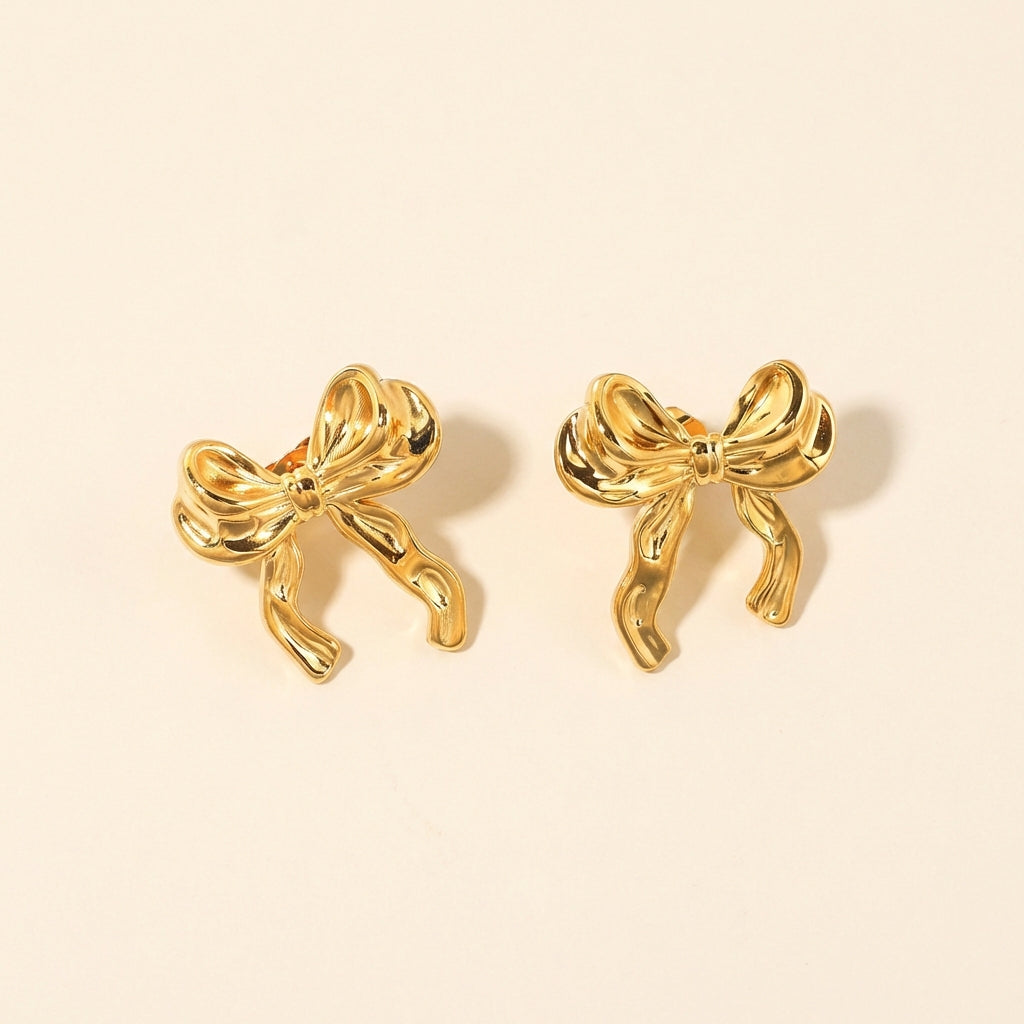 Pendientes Bow Silk con fusión en Oro 18K