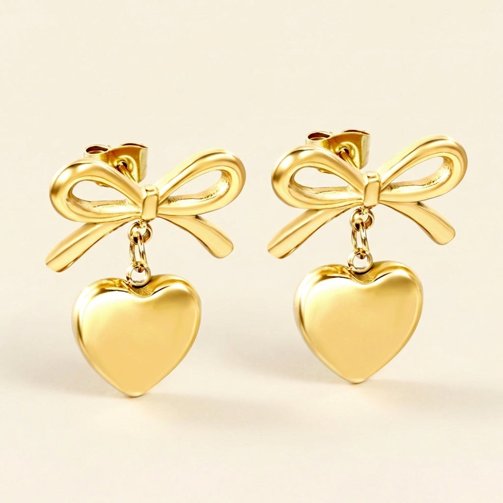 Pendientes Bow & Heart Love con fusión en Oro 18K