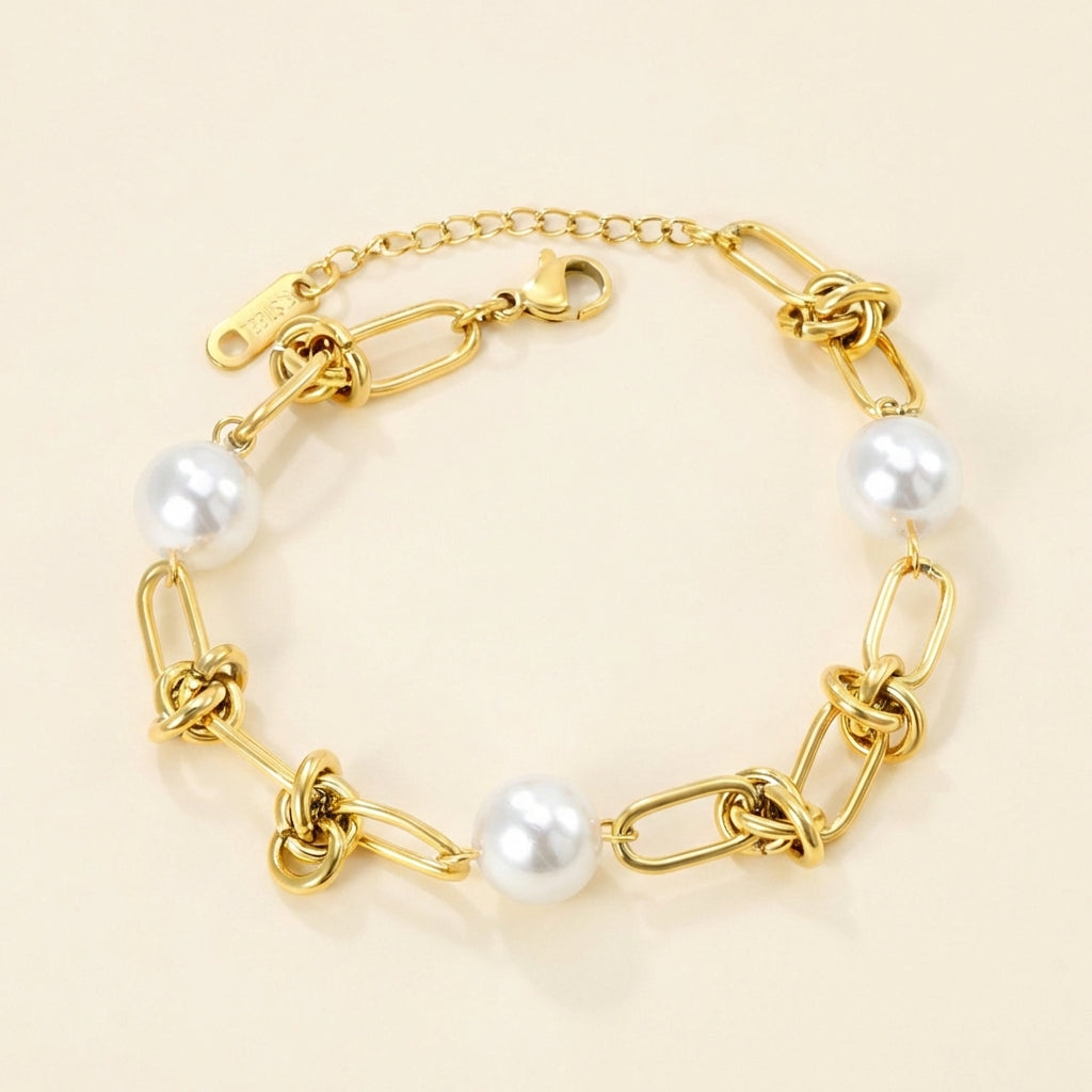 Pulsera Knot & Triple Pearl con fusión en Oro 18K