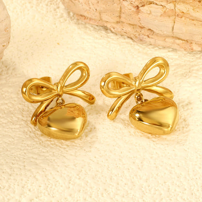 Pendientes Bow & Heart Love con fusión en Oro 18K
