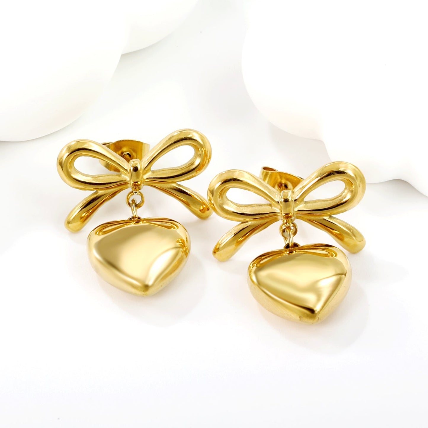 Pendientes Bow & Heart Love con fusión en Oro 18K