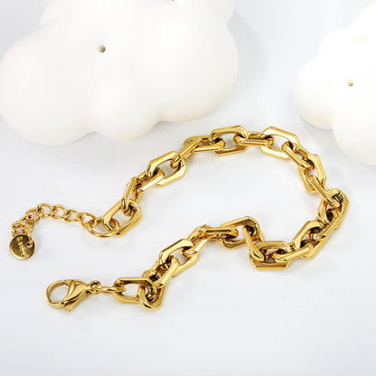Brazalete Link & Tail Plaque con fusión en Oro 18K