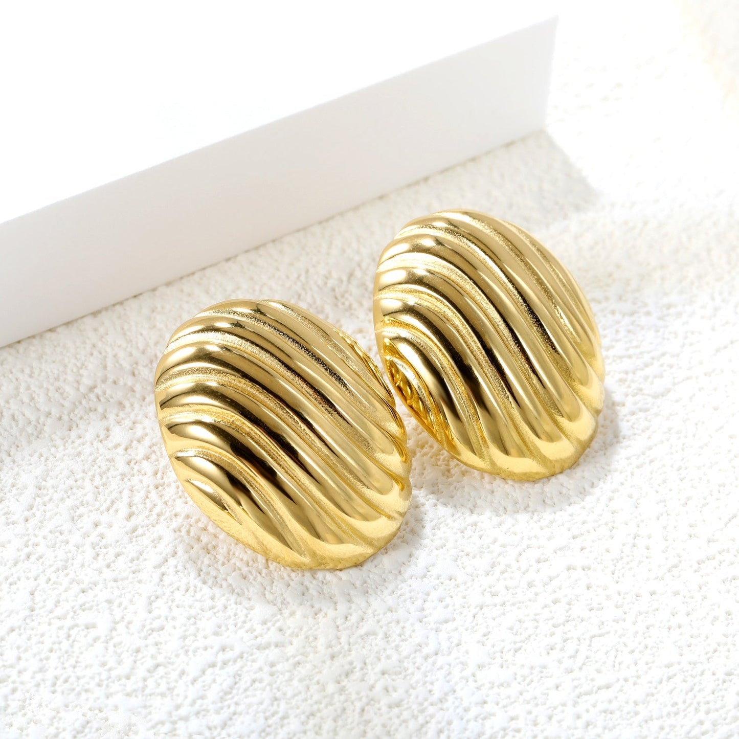 Pendientes Oval Stripe Texture con fusión en Oro 18K