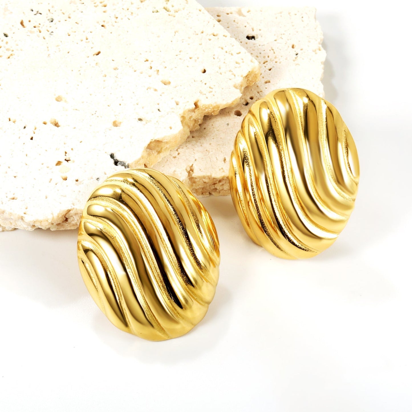 Pendientes Oval Stripe Texture con fusión en Oro 18K