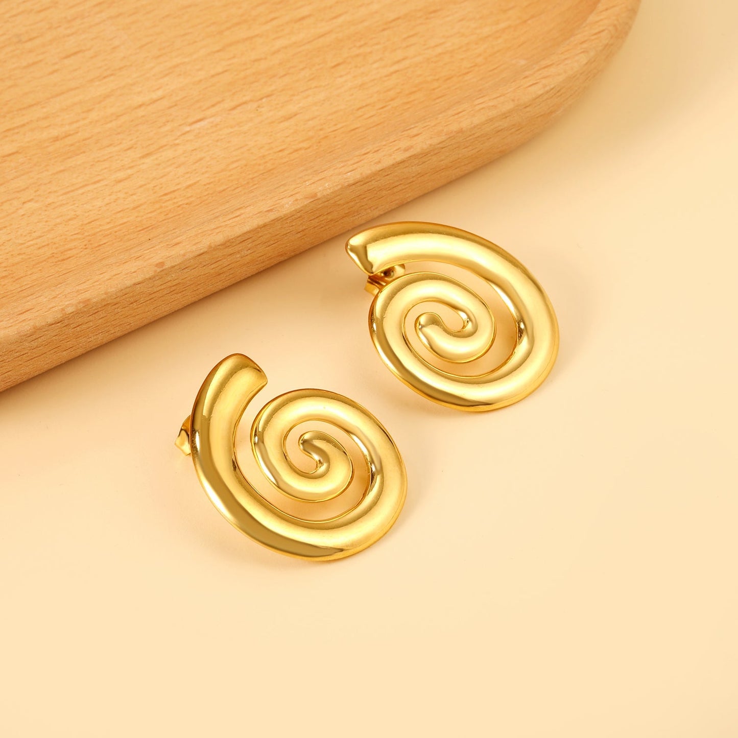 Pendientes Spiral Infinity con fusión en Oro 18K