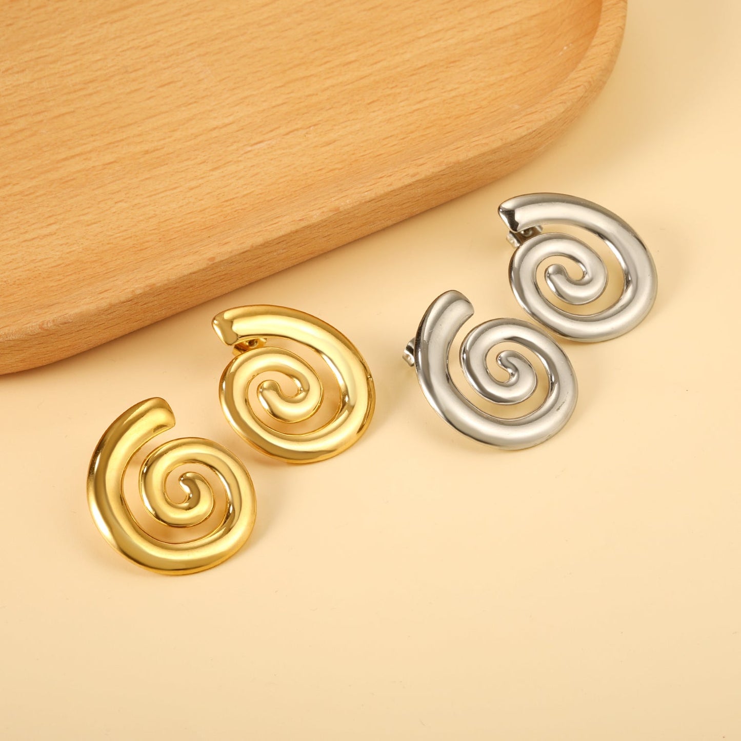 Pendientes Spiral Infinity con fusión en Oro 18K