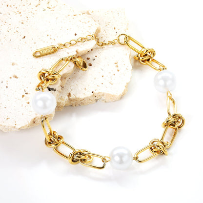 Pulsera Knot & Triple Pearl con fusión en Oro 18K