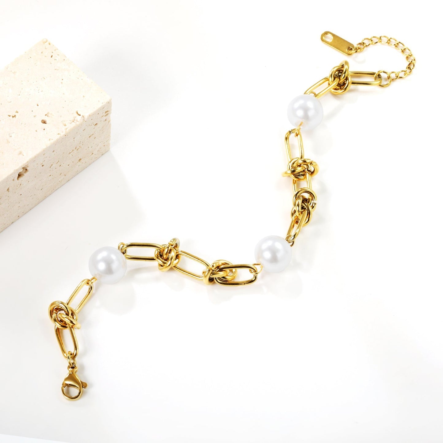 Pulsera Knot & Triple Pearl con fusión en Oro 18K