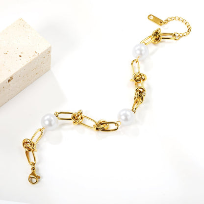 Pulsera Knot & Triple Pearl con fusión en Oro 18K