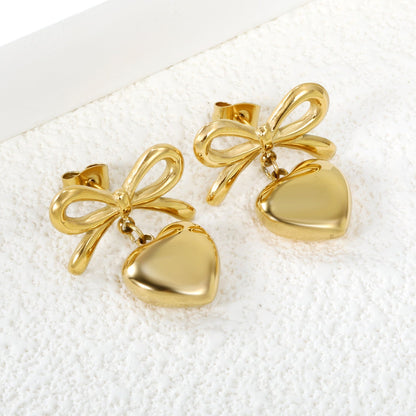 Pendientes Bow & Heart Love con fusión en Oro 18K