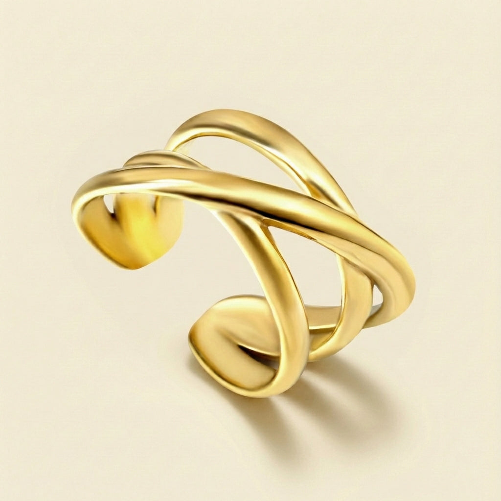 Anillo Twisted Cross con fusión en Oro 18K