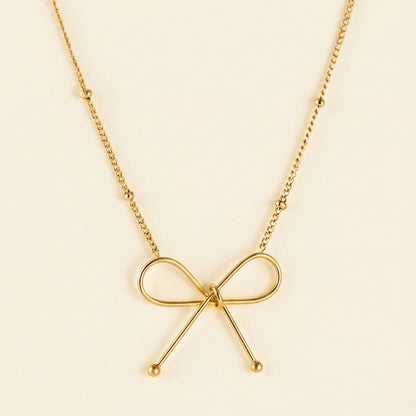 Collar Bow Pendant con fusión en Oro 18K