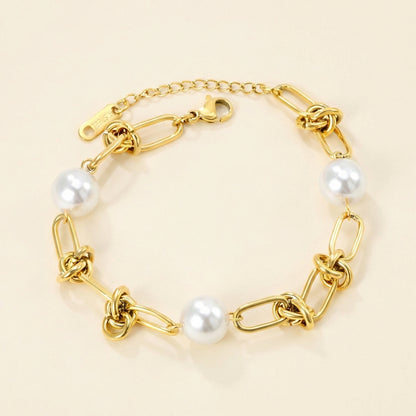 Pulsera Knot & Triple Pearl con fusión en Oro 18K