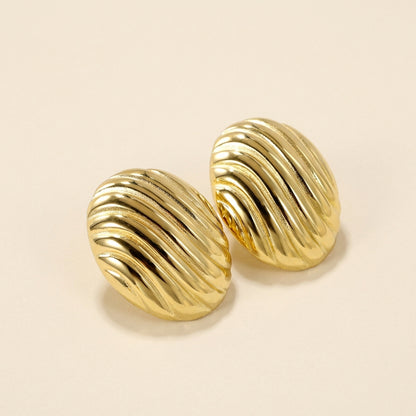 Pendientes Oval Stripe Texture con fusión en Oro 18K