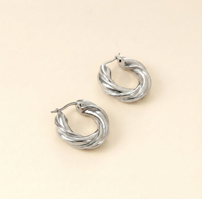 Pendientes Aro Twist Florence con fusión en Oro 18K