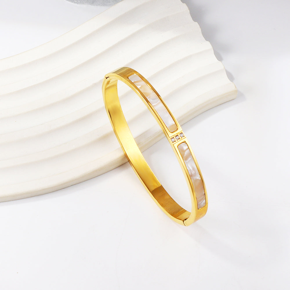 Brazalete Shell & Diamond con fusión en Oro 18K
