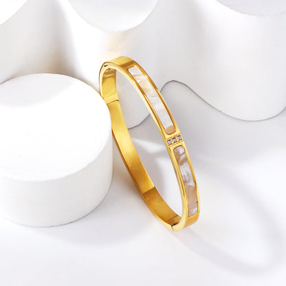 Brazalete Shell & Diamond con fusión en Oro 18K