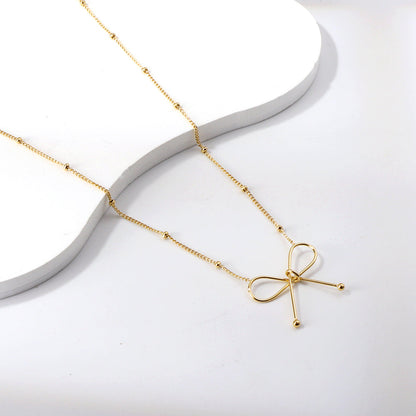Collar Bow Pendant con fusión en Oro 18K