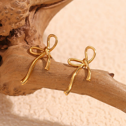 Pendientes Bow Ribbon con fusión en Oro 18K