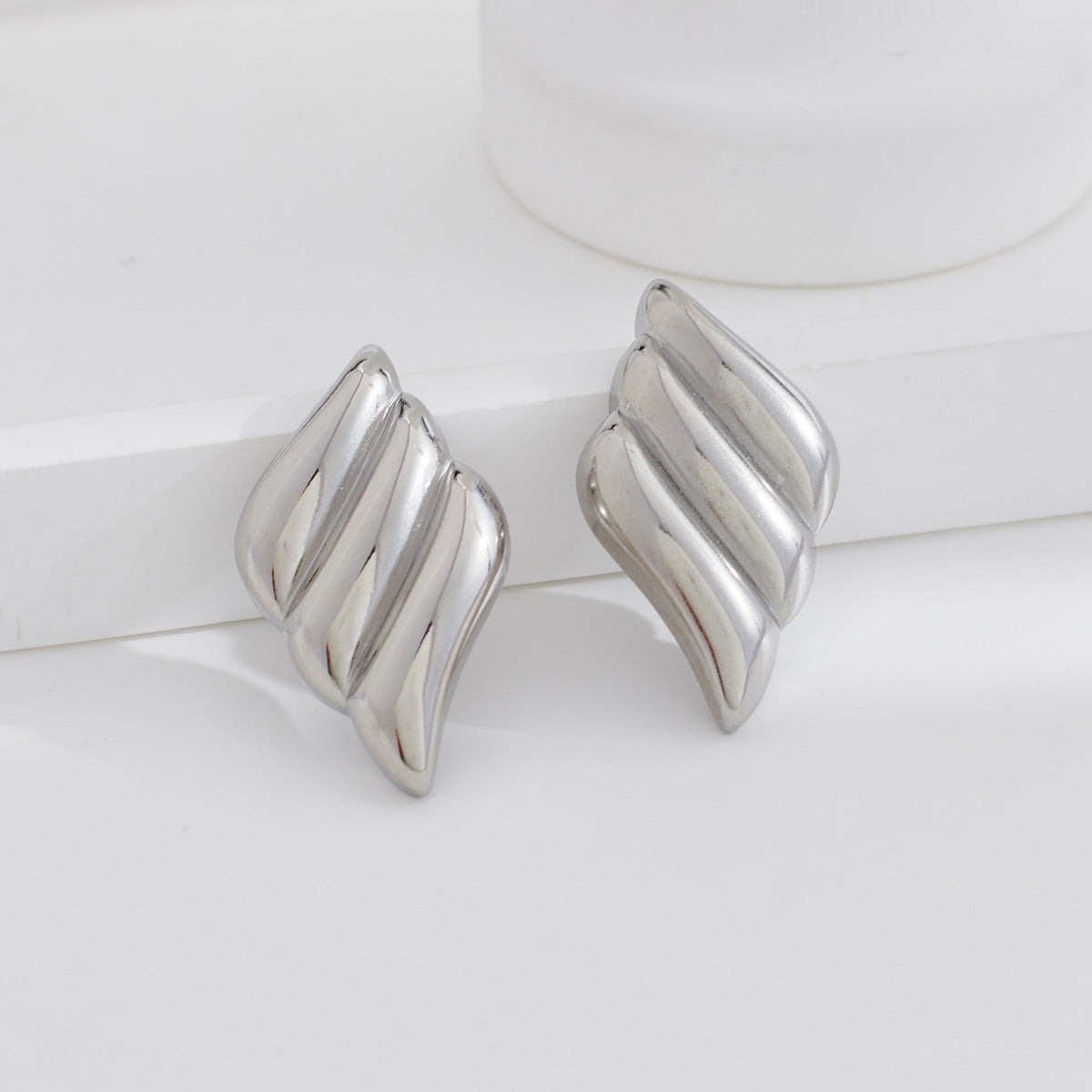 Pendientes Triple Wing con fusión en Oro 18K