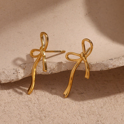Pendientes Bow Ribbon con fusión en Oro 18K