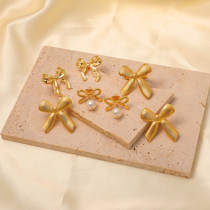 Pendientes Bow Silk con fusión en Oro 18K