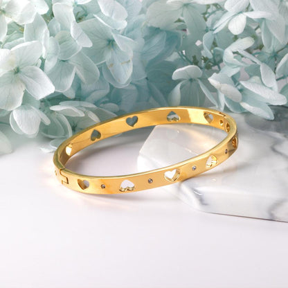 Brazalete Hollow Heart con fusión en Oro 18K