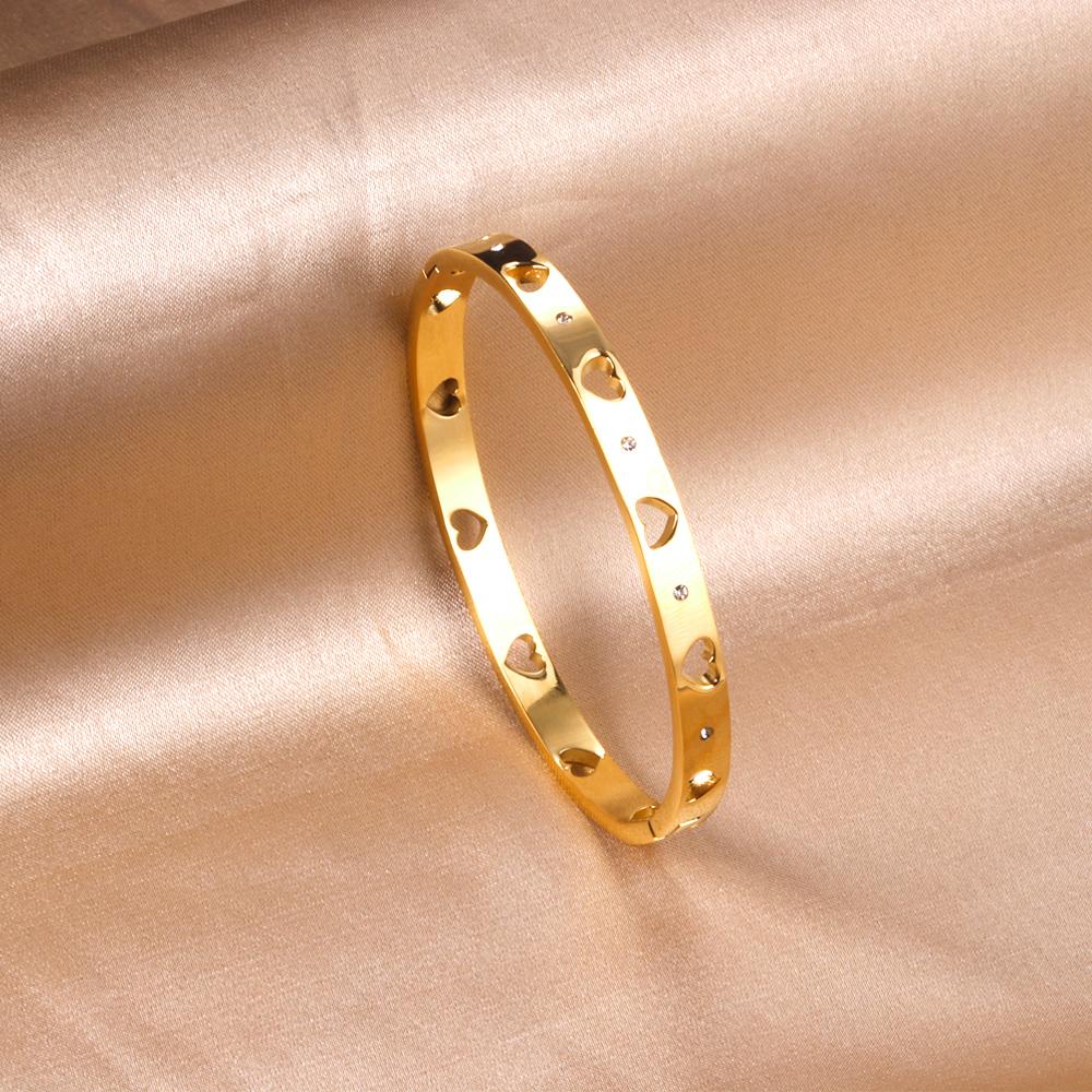 Brazalete Hollow Heart con fusión en Oro 18K