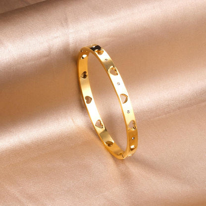 Brazalete Hollow Heart con fusión en Oro 18K