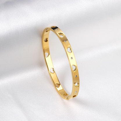 Brazalete Hollow Heart con fusión en Oro 18K